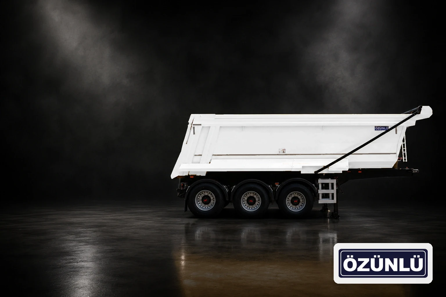 White tipping semi-trailer